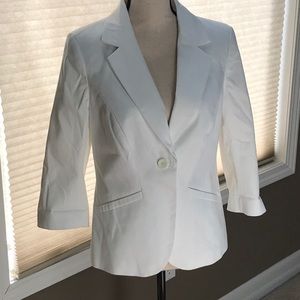 The Limited three quarter sleeve white blazer.